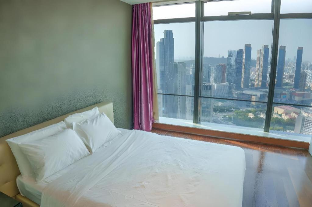 Grand Madison Qingdao Harbour-View Central（Former Qingdao Farglory Hotel） Экстерьер фото