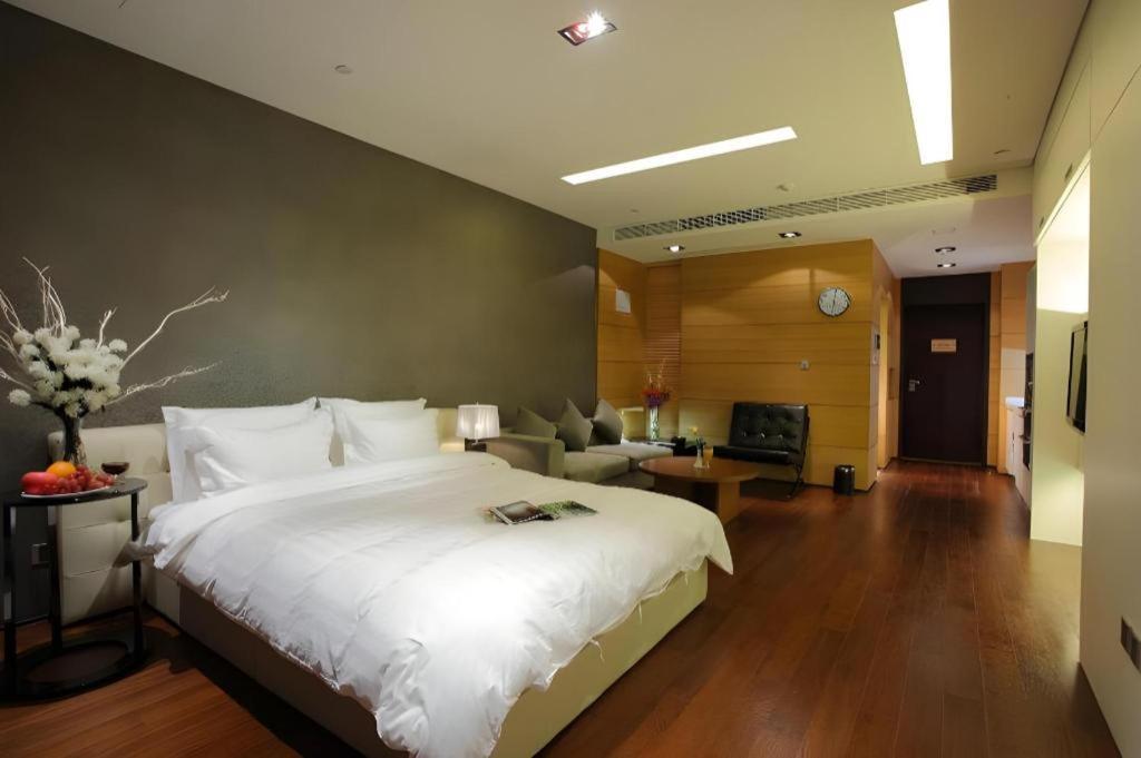Grand Madison Qingdao Harbour-View Central（Former Qingdao Farglory Hotel） Экстерьер фото
