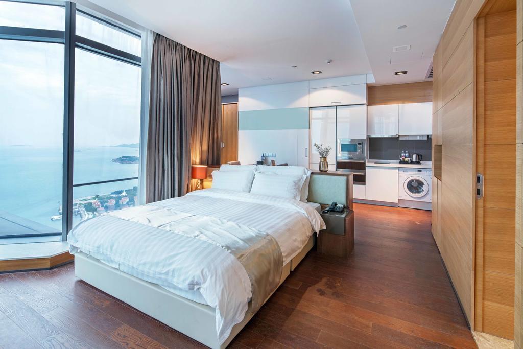 Grand Madison Qingdao Harbour-View Central（Former Qingdao Farglory Hotel） Экстерьер фото